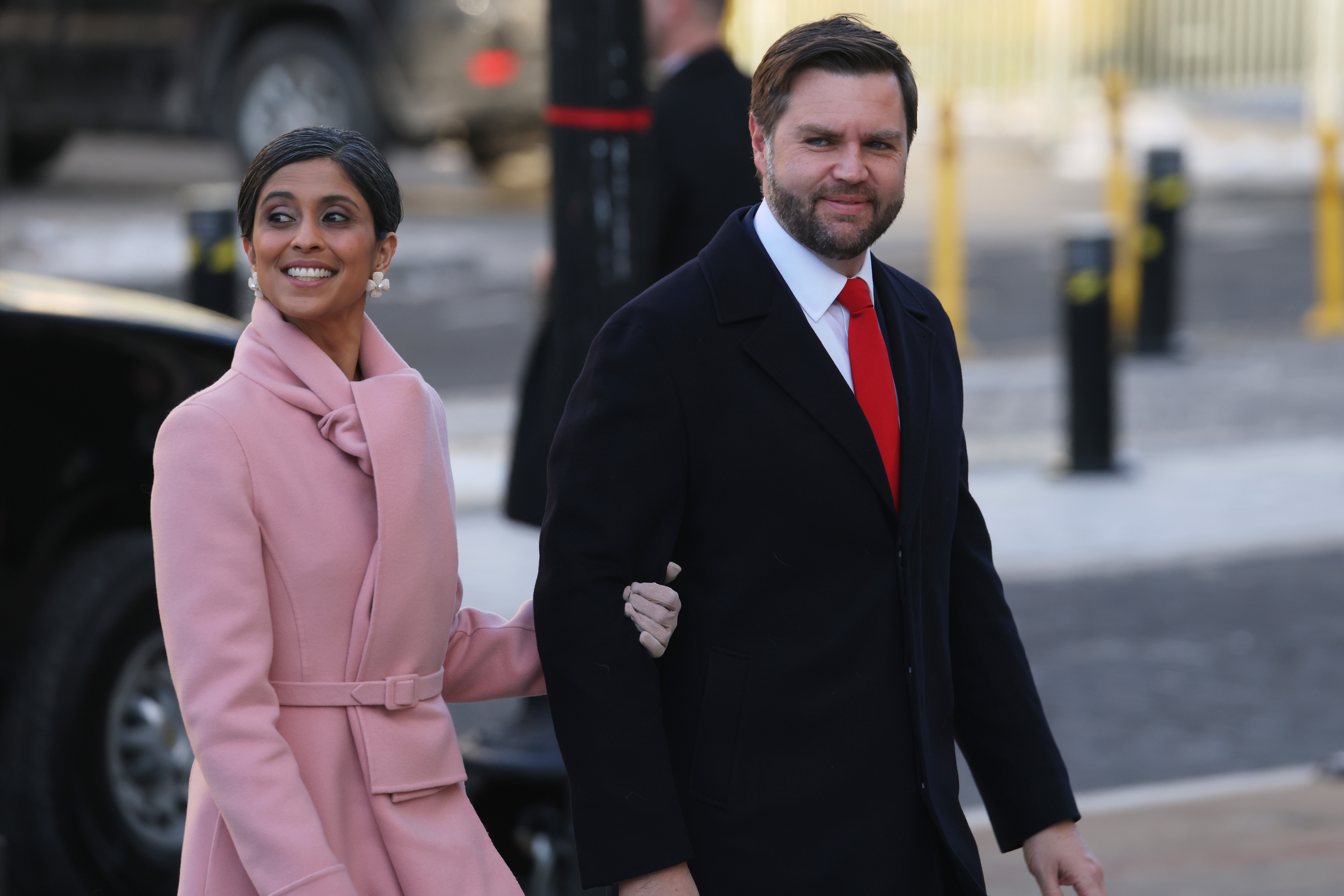 32327dd2bfc2fe2e0f70722b4459c81c610dc4398ce76b0ab25f51389e6fe323 Usha and JD Vance making their way to St. John's Church as part of Inauguration ceremonies. | Source: Getty Images