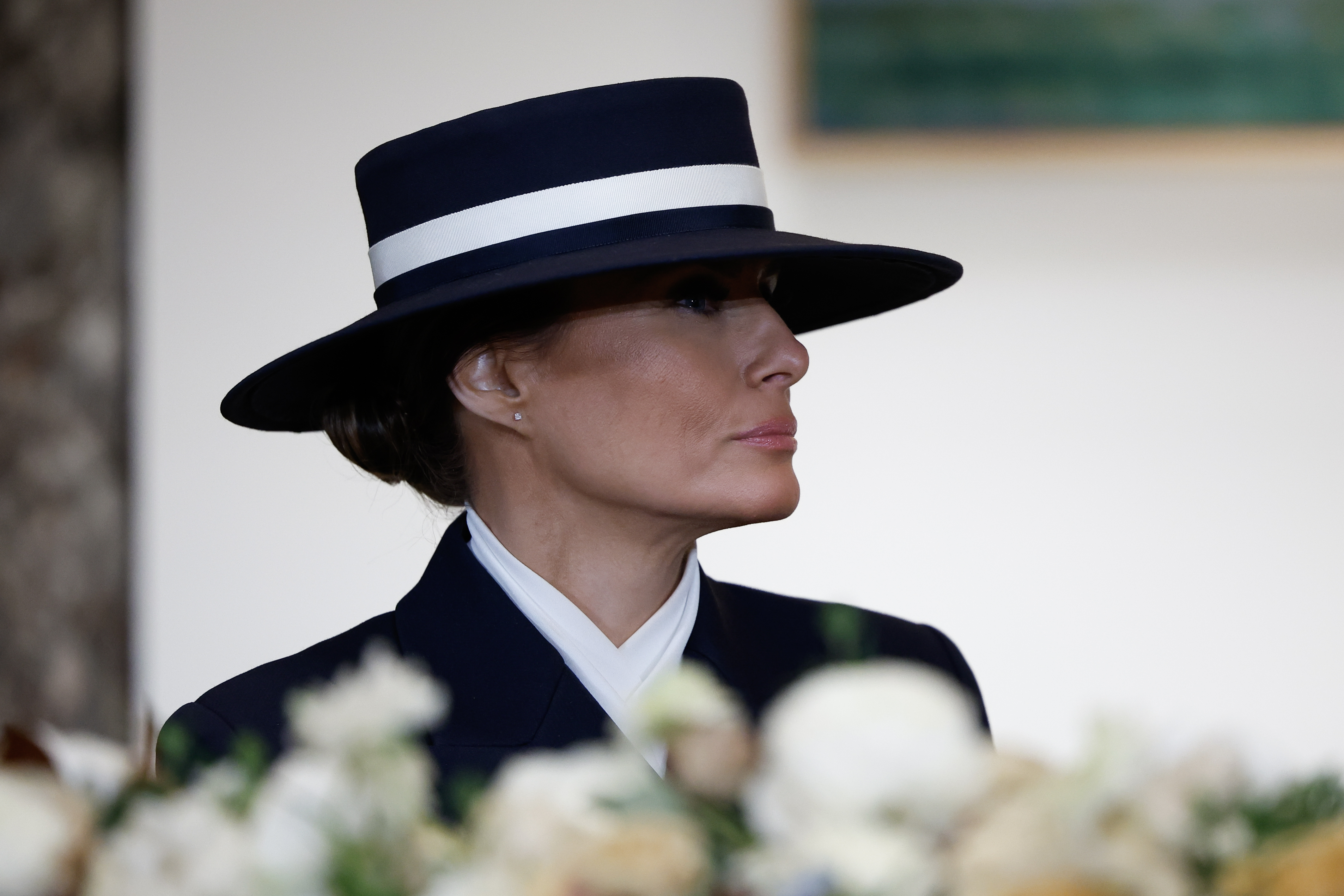 58e308b3b96a7b4f0da79f4809f481ecf4c5de6131a07fdb086f83480092ed51 Melania Trump at a luncheon after Donald Trump's inauguration. | Source: Getty Images