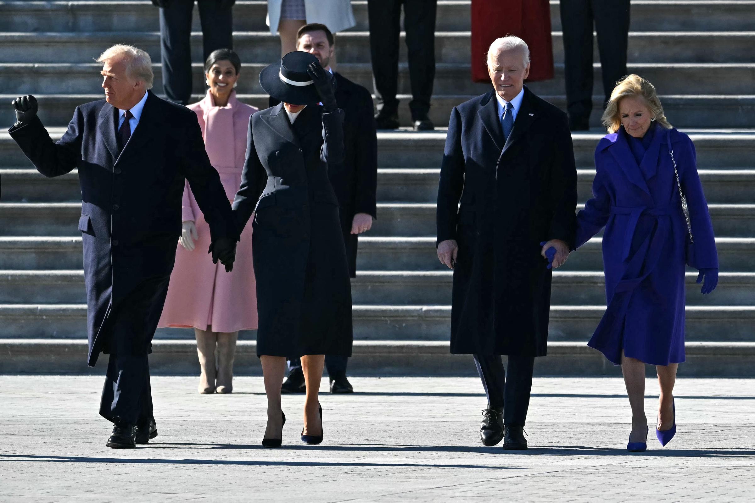 7bdbde716043c4b202e6c2976749bf23dd96557211cc52285c96b7d0ec6d18ab Donald and Melania Trump walking alongside Joe and Jill Biden with Usha and J.D. Vance behind them during a farewell ceremony. | Source: Getty Images