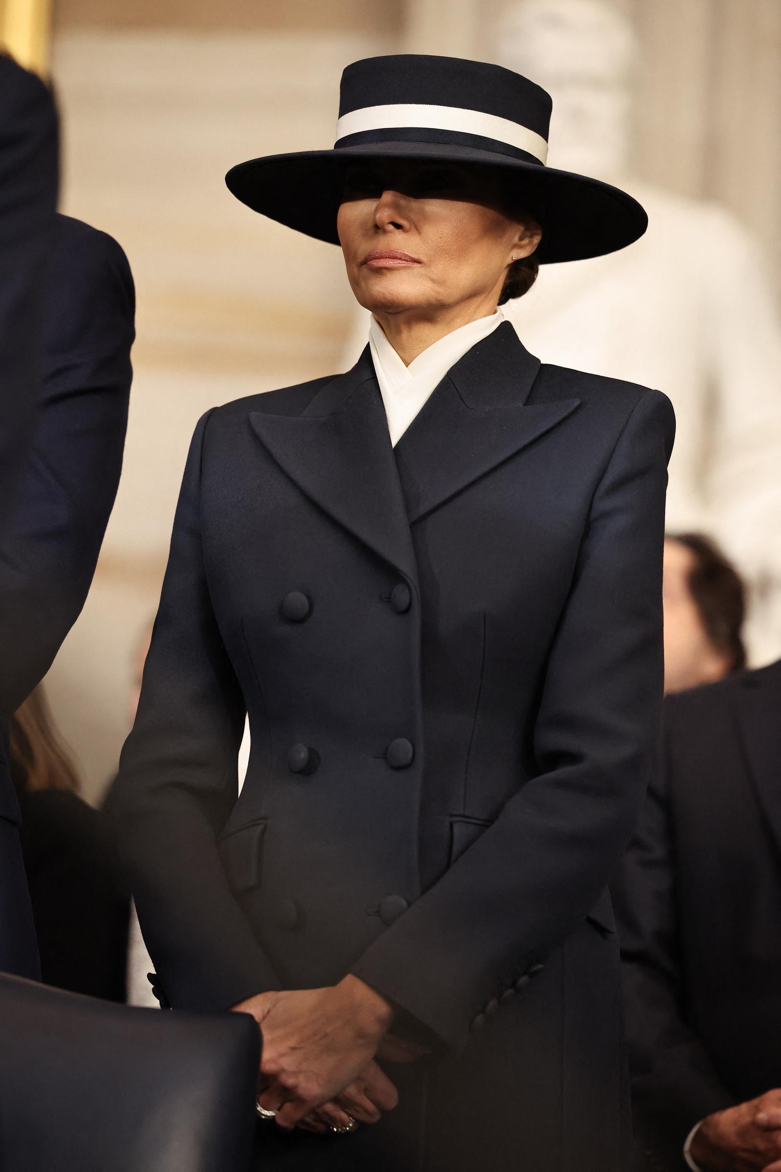 7d7642be4226158060037b40b5b001d16ed7b3bad08db46c93e5a63cb100ff85 First Lady Melania Trump at President Donald Trump's inauguration as the 47th President of the United States in Washington, DC on January 20, 2025. | Source: Getty Images