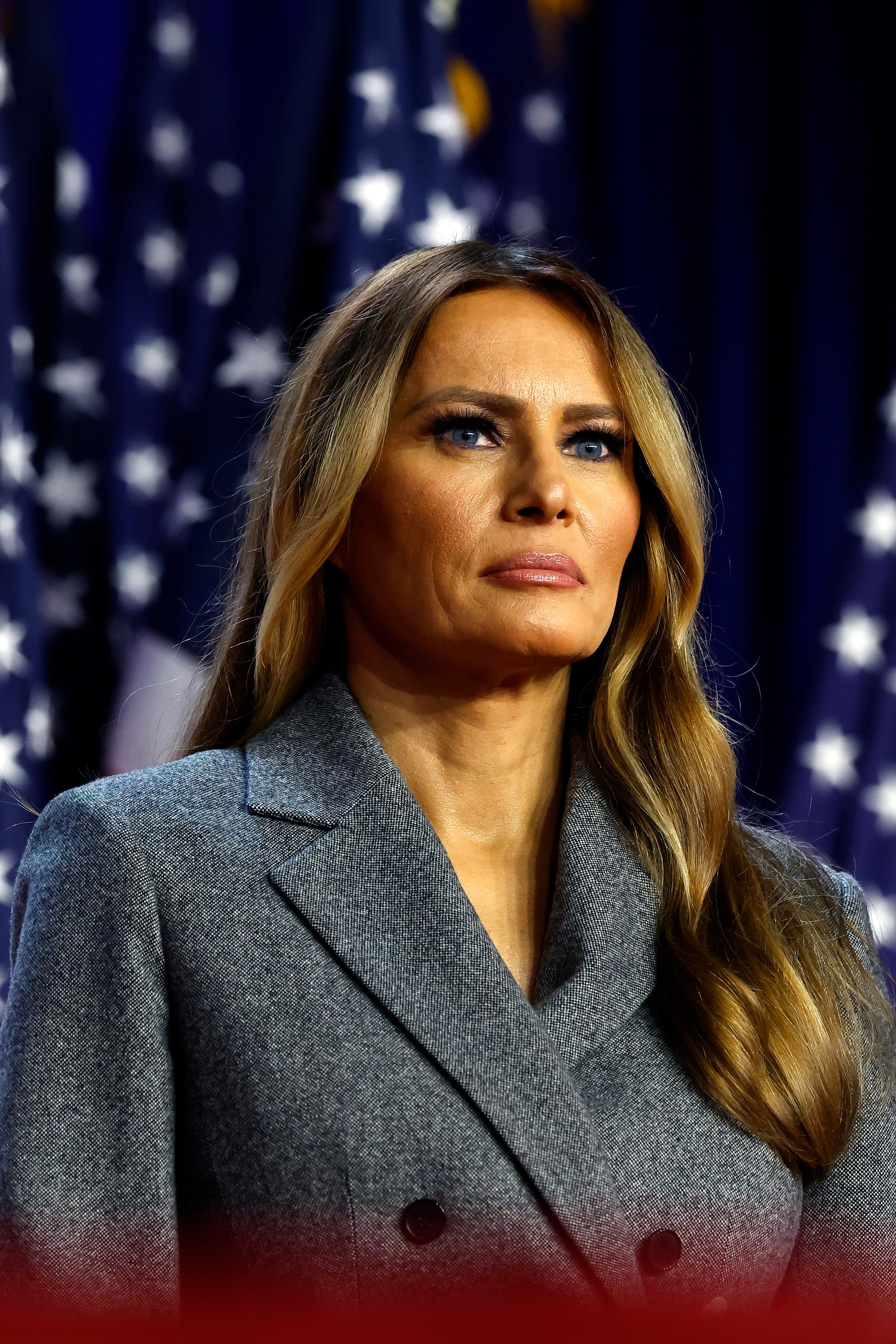 f57343748bf0b75c0170d990c15ebcfd2bdf15dfedb32f0e6a4a798b9ab0877a Melania Trump looks on during an election night event in West Palm Beach, Florida on November 6, 2024. | Source: Getty Images